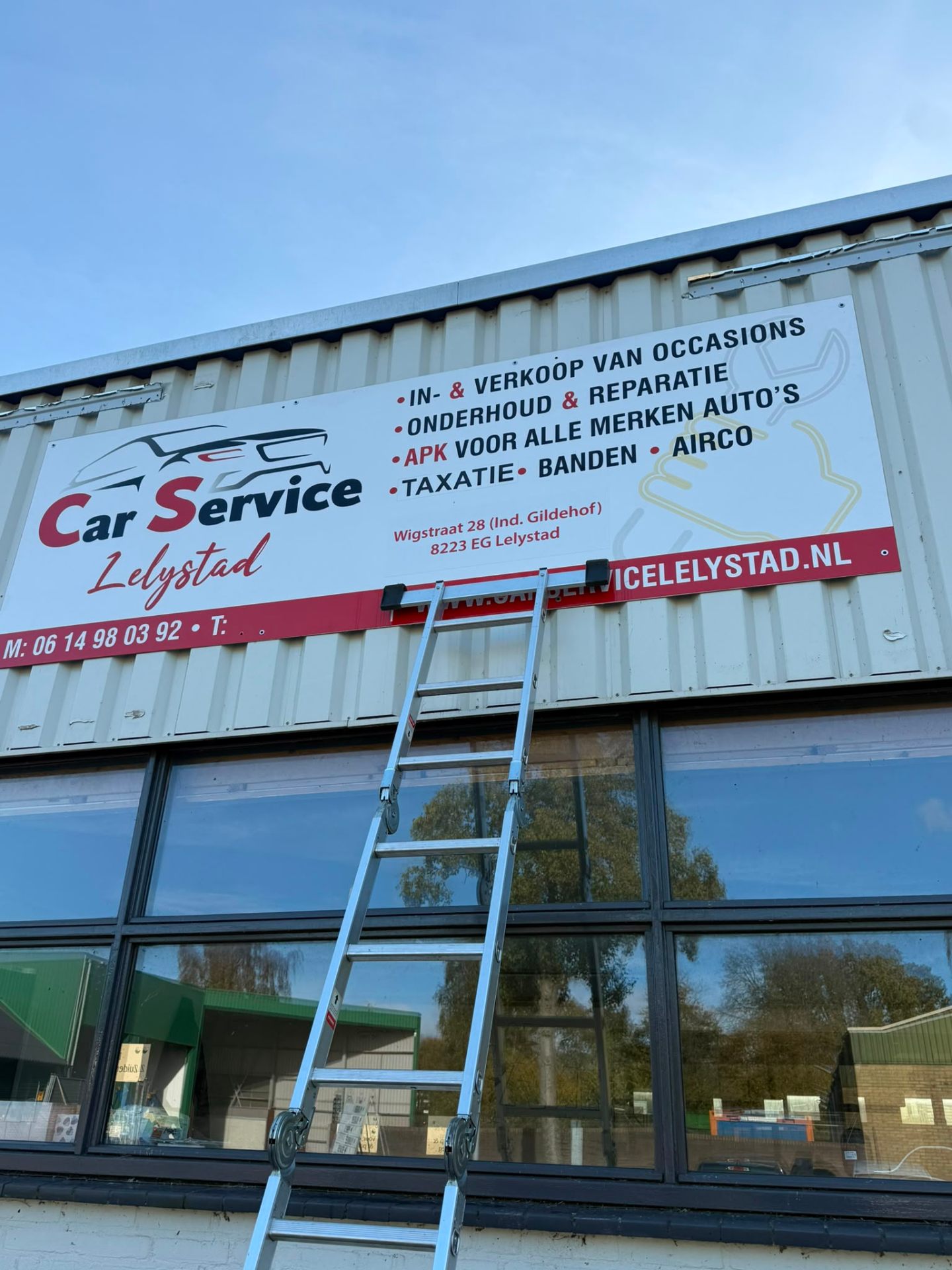 Signing, banners & gevelreclame — voorbeeld